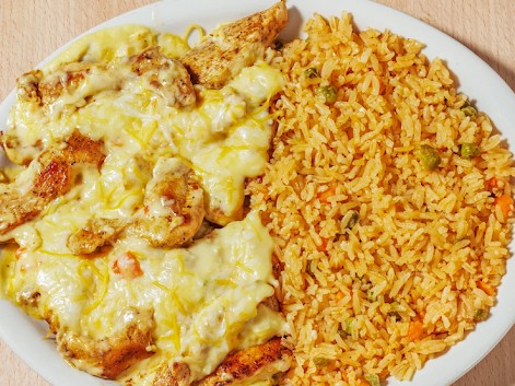 Chicken with creamy cheese sauce and Mexican rice